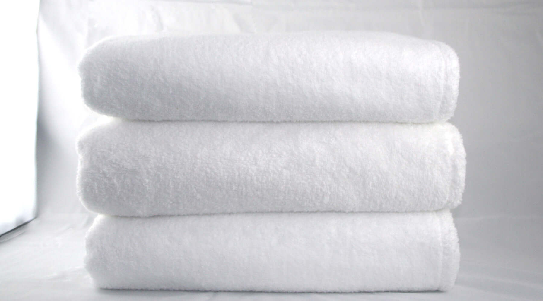 Simply for Kids stack of three white hooded towels