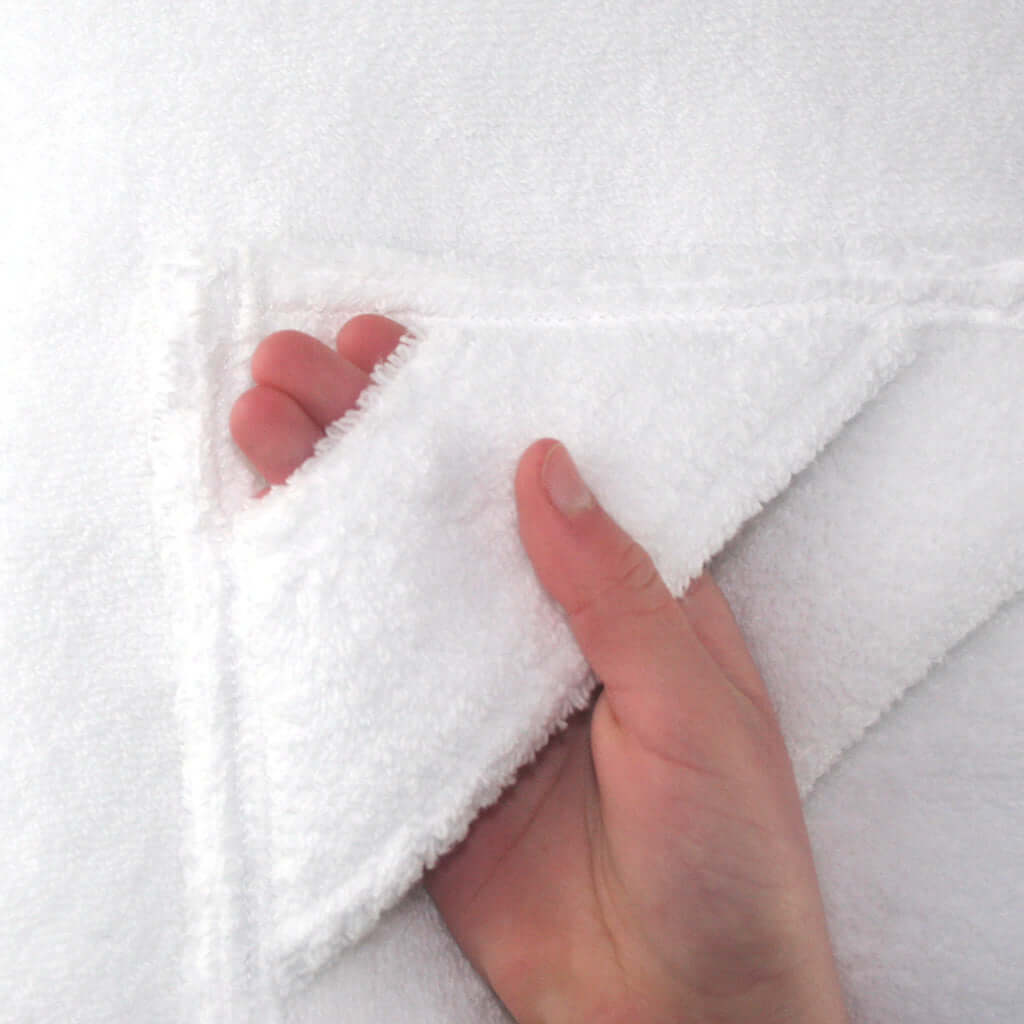 Our Simply for Kids hooded towel has grab handles to help the child wrap the towel around them, for warmth and privacy. It's double thickness is very soft and made from the 550gsm micro cotton.