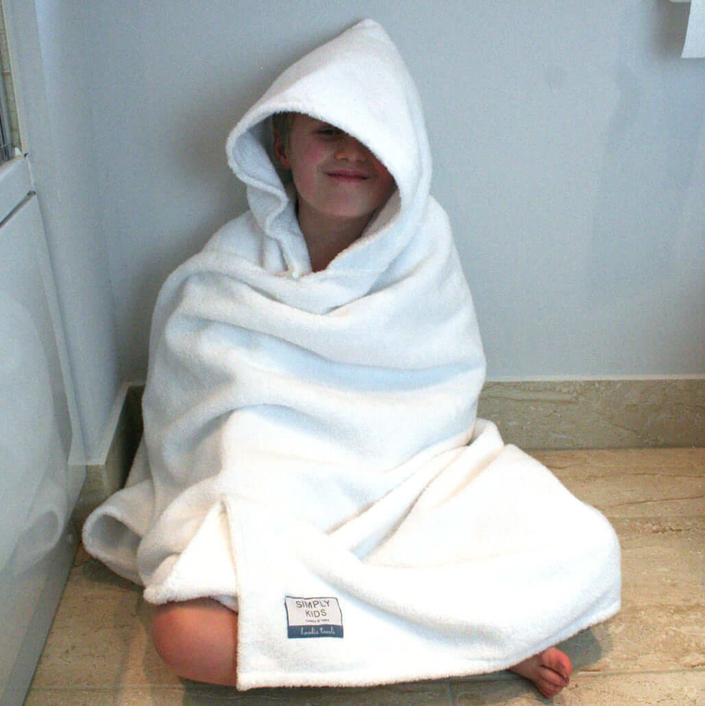 Bath towel with hood for older children. Simply for Kids hooded towels are perfect for older children, tweens and teens post bath or shower time, allowing them to wrap up warm, cosy and modestly in a hooded towel.