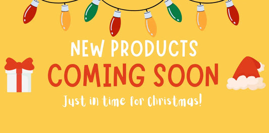 Christmas themed new products coming soon banner with gift box, Santa hat, and string lights